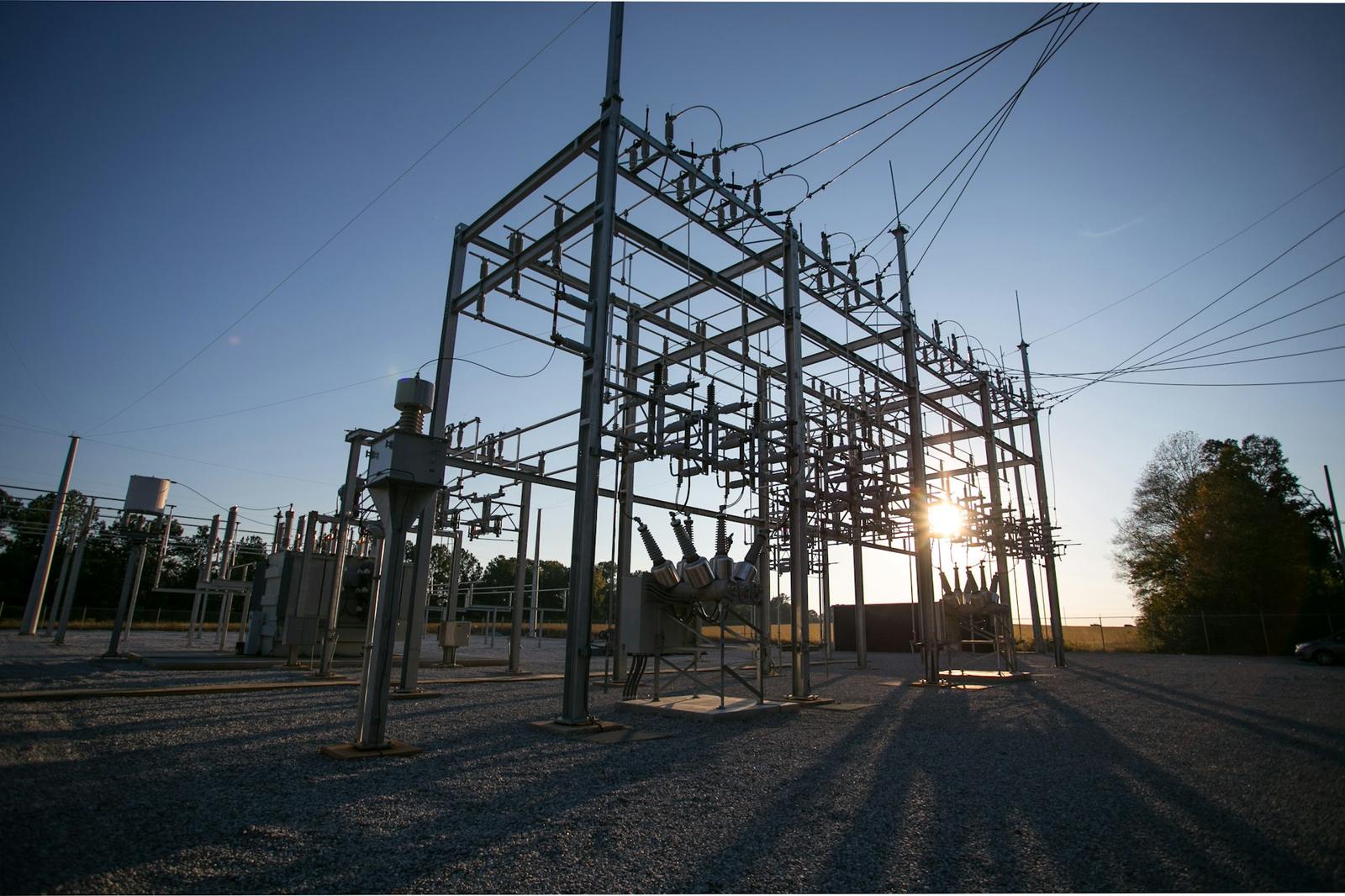 Steel structures at a substation at dusk